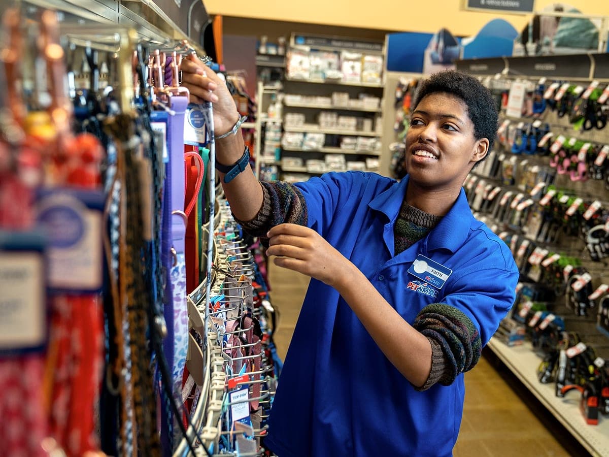 A Bridges participant working at PetSmart