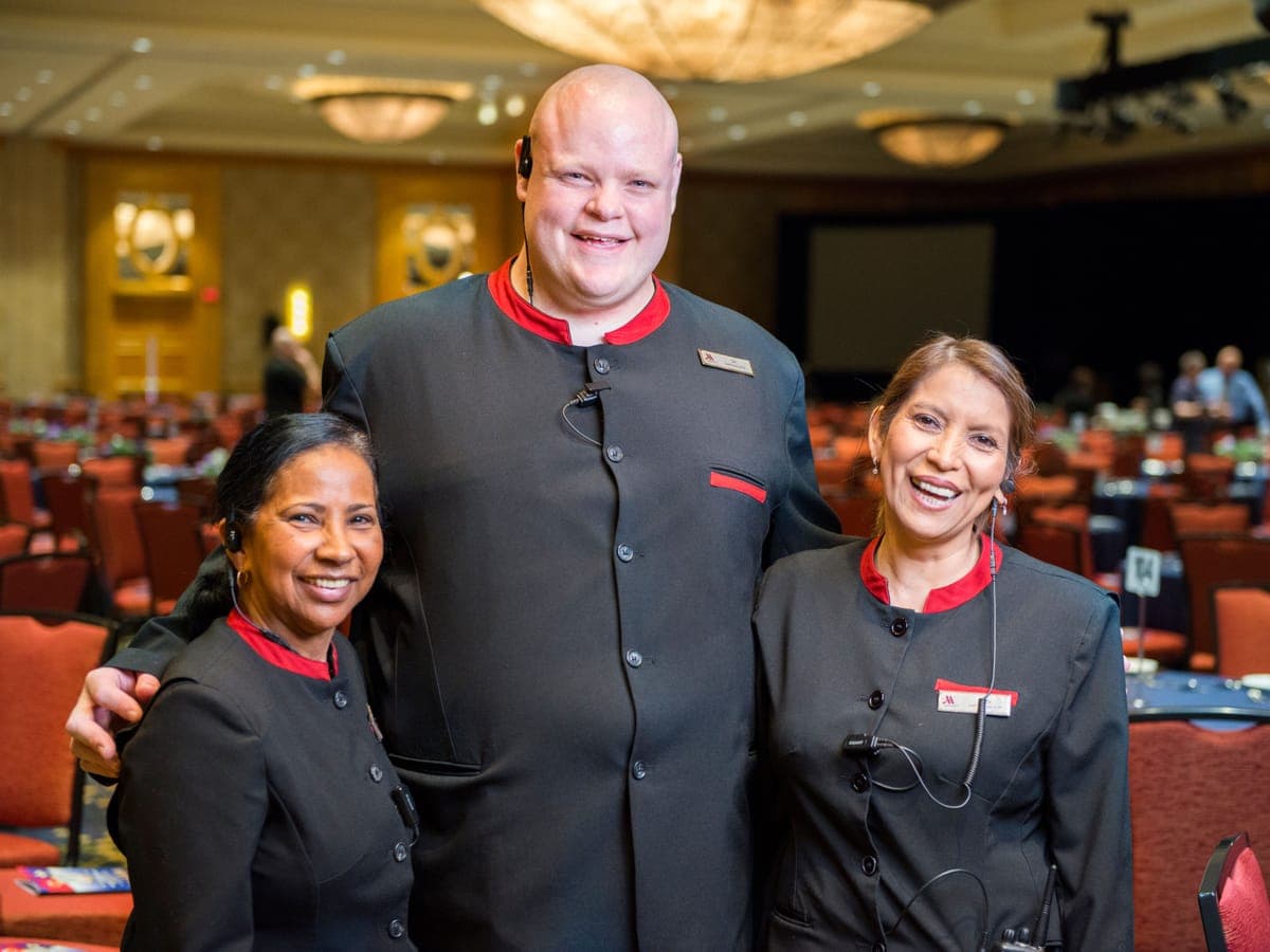 Bridges participants on a hotel banquet team