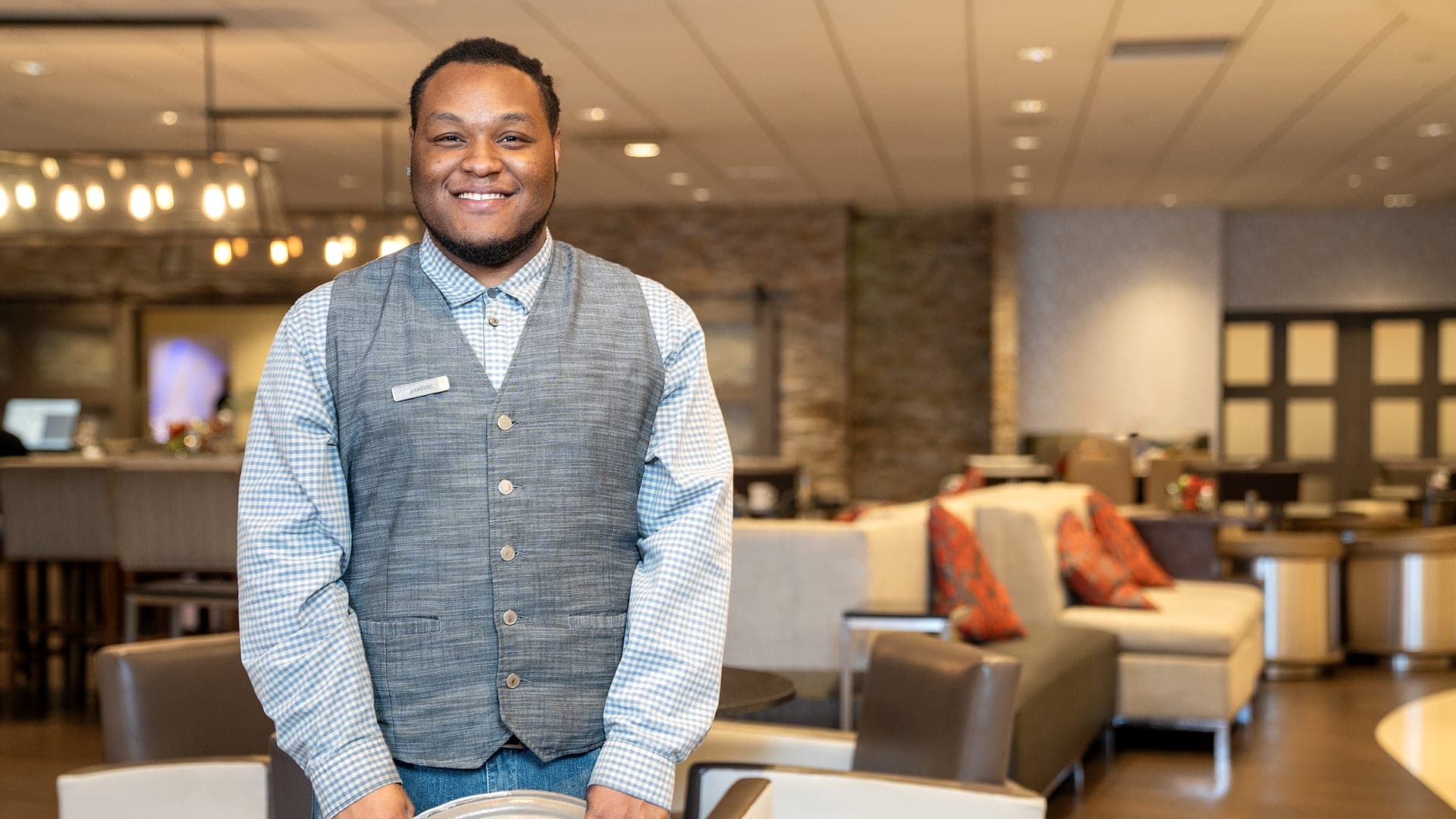 A Bridges participant at his hospitality job