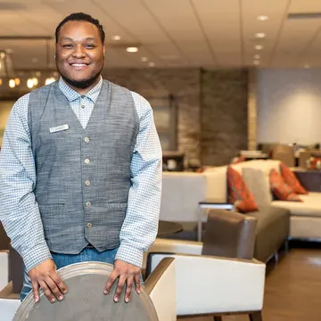 A Bridges participant at his hospitality job